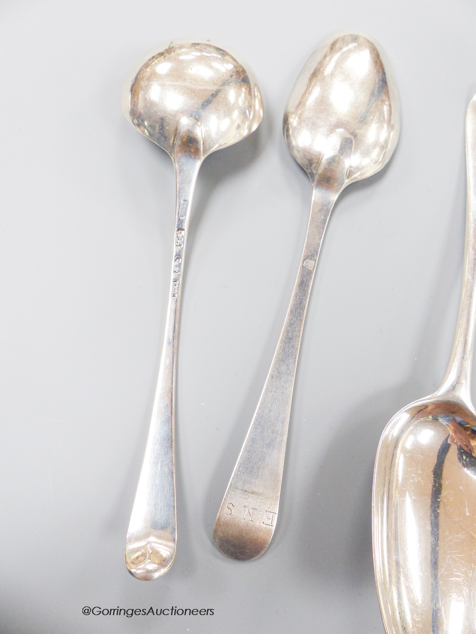 Ten assorted 18th century silver tablespoons and a similar sauce ladle, various pattern, dates and makers and six 19th century continental white metal tablespoons, gross 32.5oz.